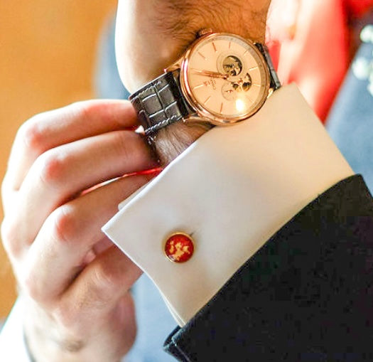 Boutons de manchettes doré