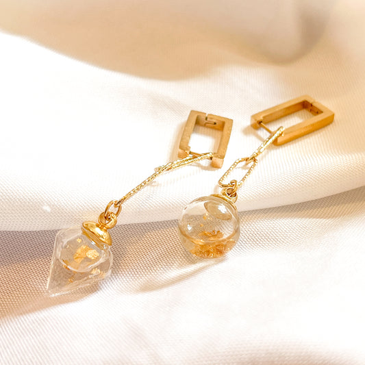 Boucles Triton asymétriques